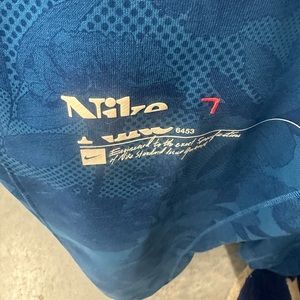 DRI-FIT NIKE
XXL
TIG
FEG